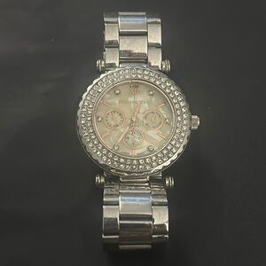 SOLD AS IS WATCH NEEDS NEW BATTERY, THE LIMITED BRAND WITH GEM BEZEL GORGEOUS